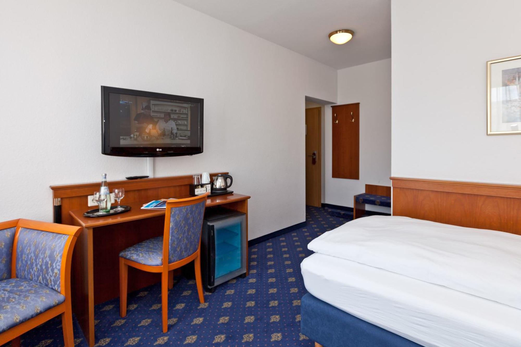 Hotel Fuer Dich Варен Стая снимка